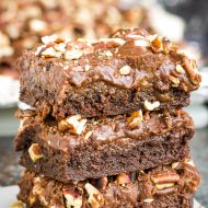 Mississippi Mud Cake Recipe is a rich, dense chocolate cake topped with marshmallows and chocolate frosting. #cake #brownies #dessert #callmepmc #recipe #cocoa #marshmallows #ganache #rockyroad #msmudcake #pecans