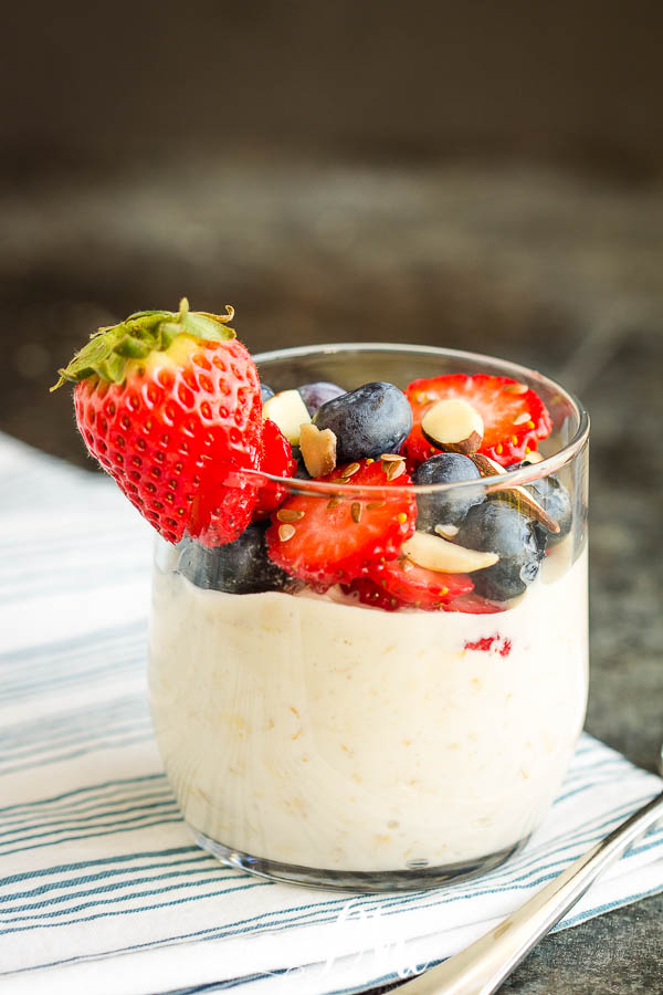 dish of overnight oatmeal topped with fresh berries.