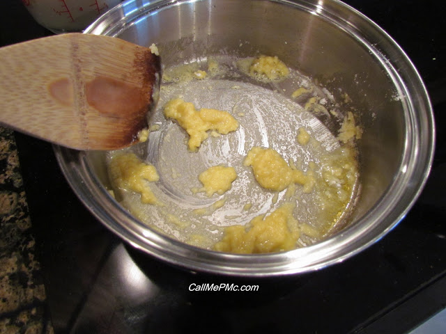 making roux for a cream sauce in a saucepan.