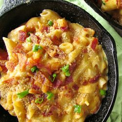 Crawfish mac and cheese in cast iron pan.