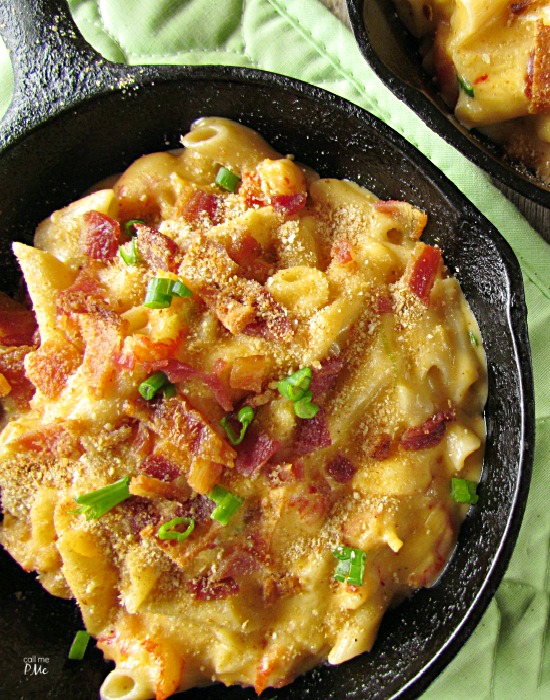 Baked crawfish mac and cheese in a skillet.