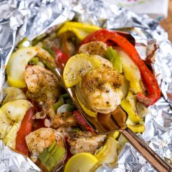 Delicious, healthy, and done in 30 minutes Shrimp Foil Packs in Oven are cooked in foil packets for a fuss-free weeknight meal and easy cleanup! #shrimp #foilpack #camping #campfire #grill #bake #oven #30minutemeal