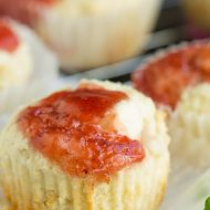 A necessary indulgence any day of the week, Strawberry Cream Muffins are filled with cream cheese and strawberry jam.