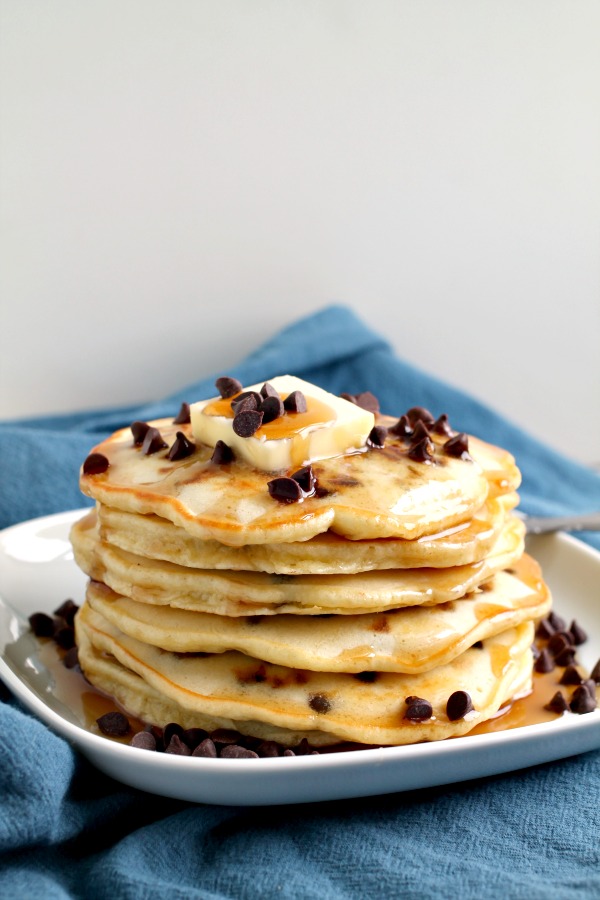 Light, fluffy, and super easy homemade Chocolate chip Pancakes are the most delicious breakfast treat. #pancakes #breakfast #recipe #homemade #fromscratch #chocolatechip Chocolate chip Pancakes