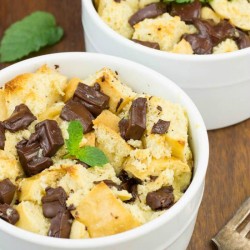 Chocolate Chunk Bread Pudding in white ramekins.