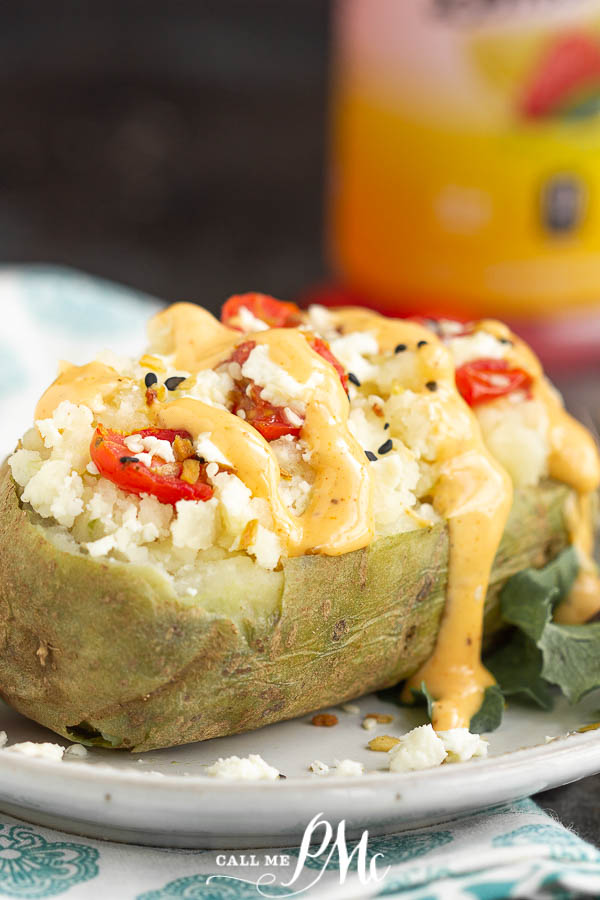 Twice Baked Feta Tomato Potatoes make a delicious main or side dish and compliment any main entree. They're cheesy and full of flavor. #stuffedpotatoes #twicebakedpotatoes #recipe #sidedish #collegestudentrecipes #callmepmc
