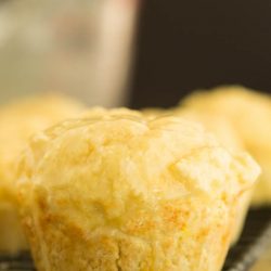 Brighten your day with these little bits of sunshine! Orange Muffins are topped with a sweet citrus glaze and make a tasty on-the-go breakfast.