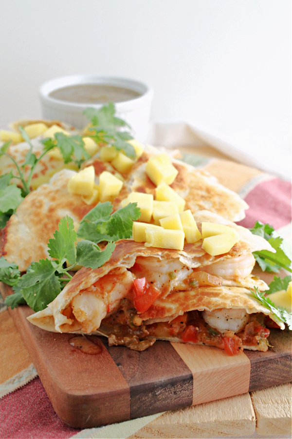 cut quesadillas on cutting board Shrimp Quesadilla