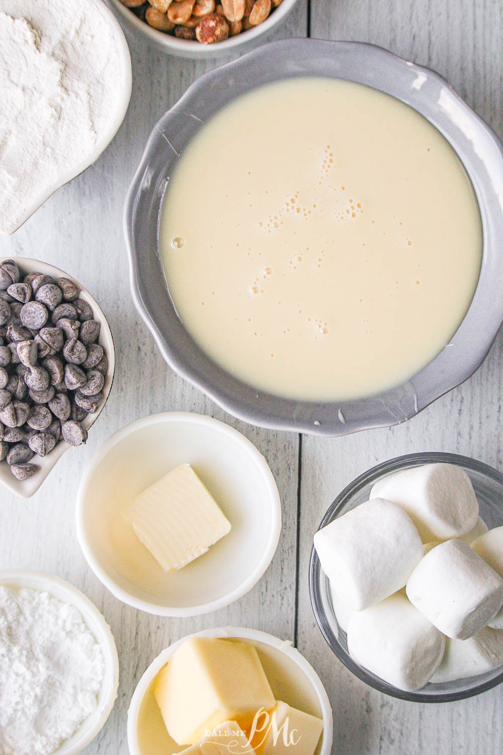 bowls of ingredients to make snickers bars.