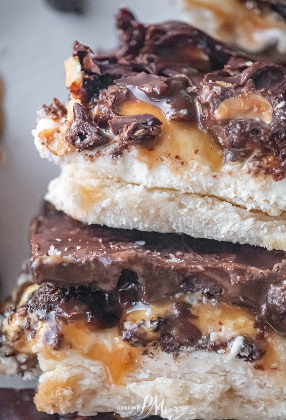 sweet dessert bars with peanuts and nougat on a cookie crust.