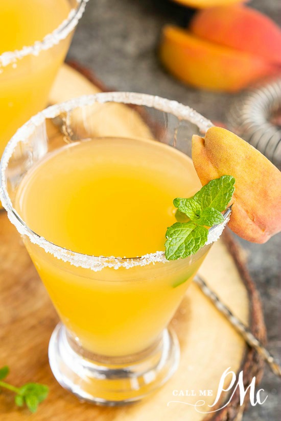 Peach Bellini Martini with vodka, peach schnapps, and peach nectar makes the perfect refreshing cocktail for a warm afternoon or a fancy brunch.