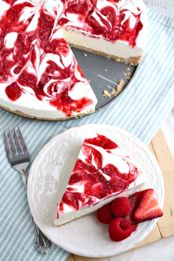 Quick and simple to prepare, Raspberry Strawberry No-Bake Cheesecake is an ideal dessert recipe for hot weather. #cheesecake #nobake #nocook #dessert #recipe #raspberry #strawberry