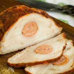 This stunning Stuffed Smoked Pork Loin is slightly spicy from the sausage. It's delicious and easy to make and great for low-carb, keto and paleo diets.