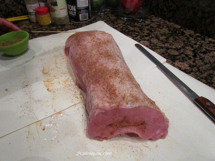 Raw pork on a cutting board.