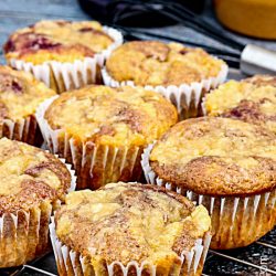 Peanut Butter and Jelly Muffins is the breakfast equivalent of your favorite lunch! This kid friendly and adult approved recipe is great for on-the-go breakfast, lunch treats, and after-school snacks.