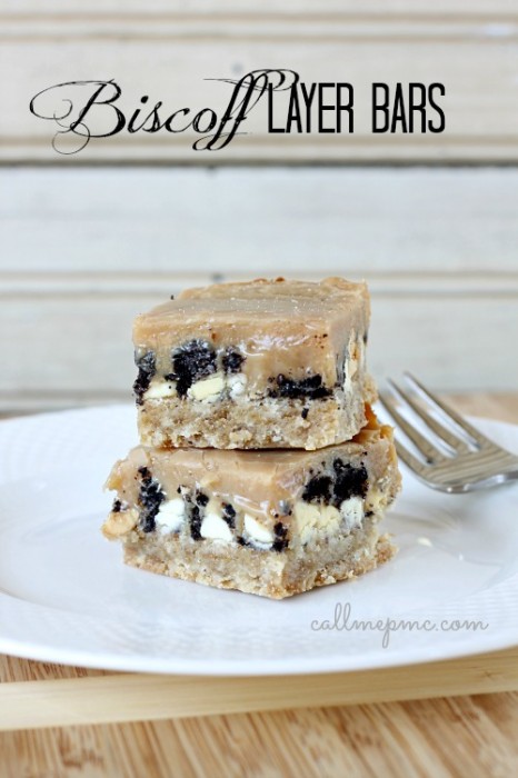 layered dessert bars on a plate.