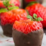 Novelty Chocolate Covered Strawberry Shooters with edible shot glass is perfect for your next party or a night in! #cocktails #happyhour #strawberries #tequila #tequilashot #drinks #easy #recipe #chocolate