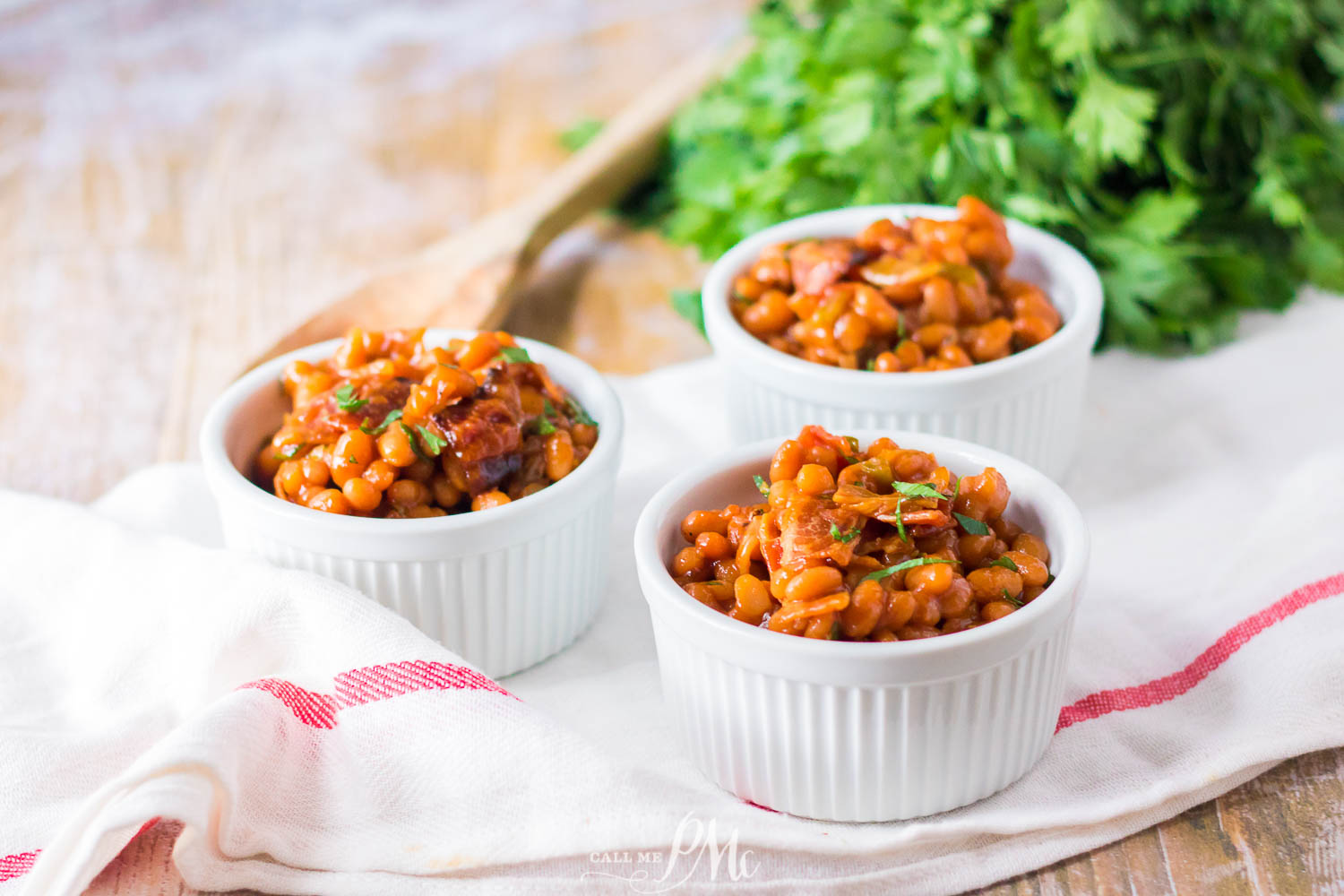 Slow Cooker BBQ Beans are cooked low and slow to bring out the best flavors! They're sweet, tangy, smokey, and hearty.