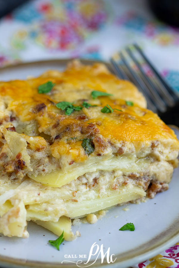 Cheesy Bacon Scalloped Potatoes is a quick easy scalloped potato recipe that has layers of potatoes, onions, cheese sauce, and bacon. #callmepmc #recipes Cheesy Bacon Scalloped Potatoes