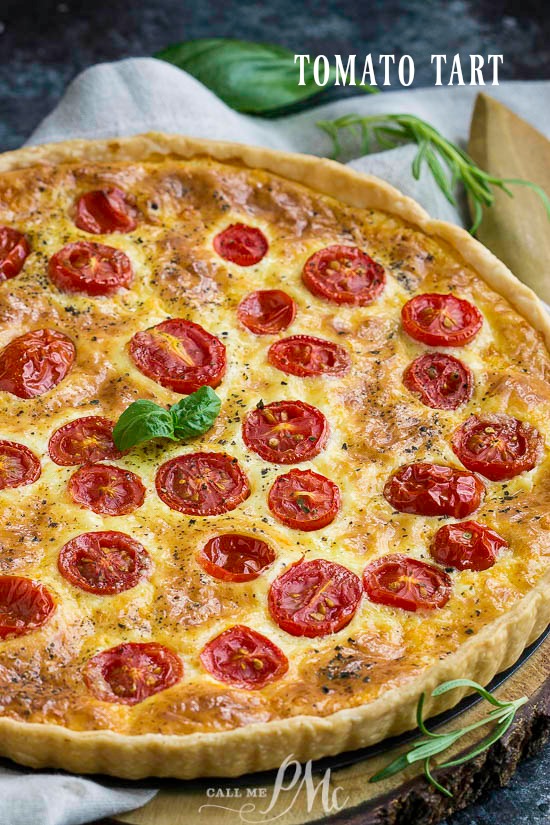 Tomato Cheese Tart has a buttery, flaky, and tender crust filled with creamy cheese and topped with sun-ripened tomatoes. #easyrecipes #recipe #heirloom #tart #vegetables #farmtotableย #cheese #baked #fromscratch #cooking ย #plantblased #French #piecrust #tomato #cherrytomato #Gouda Tomato Cheese Tart