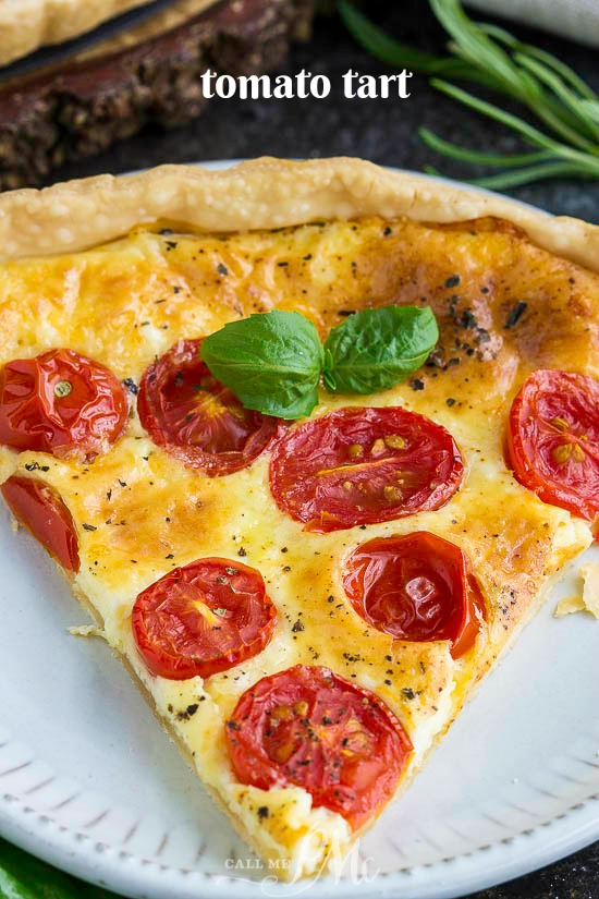Tomato Cheese Tart has a buttery, flaky, and tender crust filled with creamy cheese and topped with sun-ripened tomatoes. #easyrecipes #recipe #heirloom #tart #vegetables #farmtotableย #cheese #baked #fromscratch #cooking ย #plantblased #French #piecrust #tomato #cherrytomato #Gouda Tomato Cheese Tart