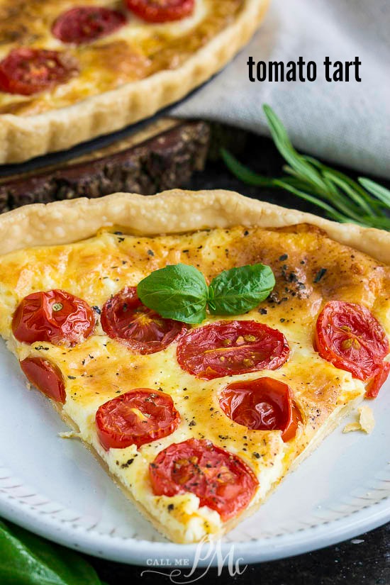 Tomato Cheese Tart has a buttery, flaky, and tender crust filled with creamy cheese and topped with sun-ripened tomatoes. #easyrecipes #recipe #heirloom #tart #vegetables #farmtotableย #cheese #baked #fromscratch #cooking ย #plantblased #French #piecrust #tomato #cherrytomato #Gouda Tomato Cheese Tart