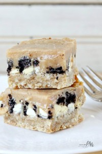 Biscoff bars stacked on a plate.