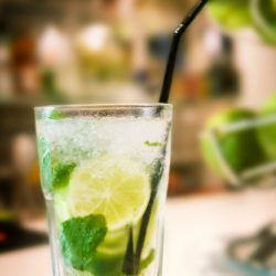 Real Mojito is a traditional cocktail with lime & mint with a hint of sweet. It's a favorite in the South during the hot, humin months! #mojito #cocktail #lime #mint #recipe