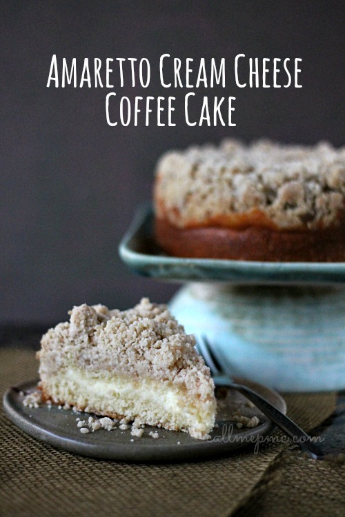 Amaretto Cream Cheese Coffee Cake Recipe is a sweet, dense coffee cake topped with extra crumb topping and filled with a ribbon of cream cheese. #coffeecake #cake #dessert #creamcheese #streusel #baking Amaretto Cream Cheese Coffee Cake Recipe is a sweet, dense coffee cake topped with extra crumb topping and filled with a ribbon of cream cheese.
