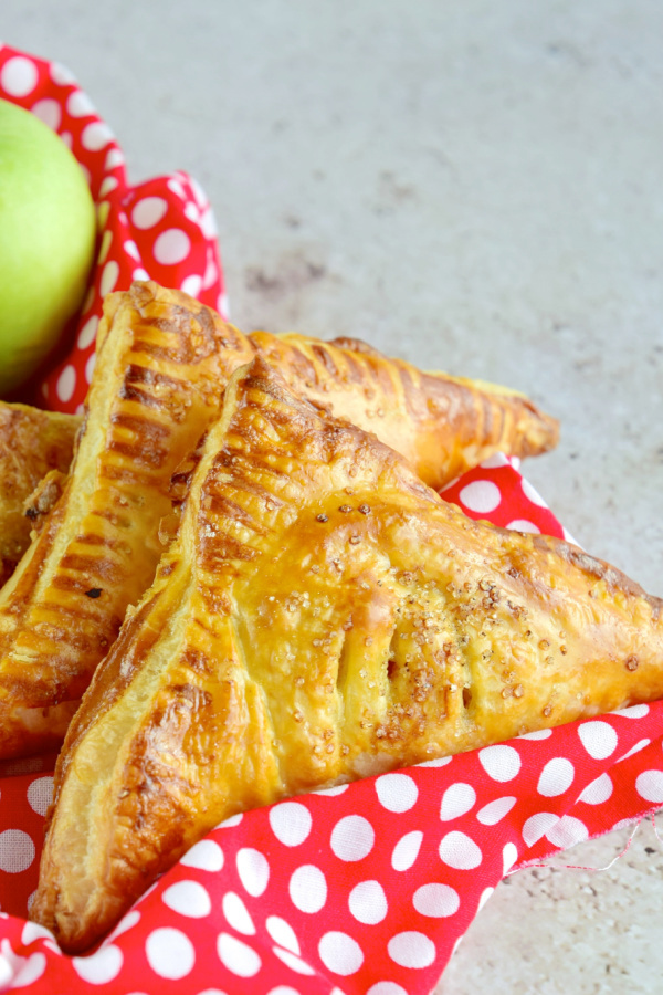 Easy Apple Turnovers are light, flaky & filled with apple cinnamon goodness!