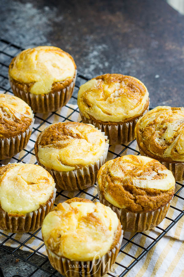 Marbled muffins on cooling wire rack Pumpkin Cream Cheese Swirl Muffins
