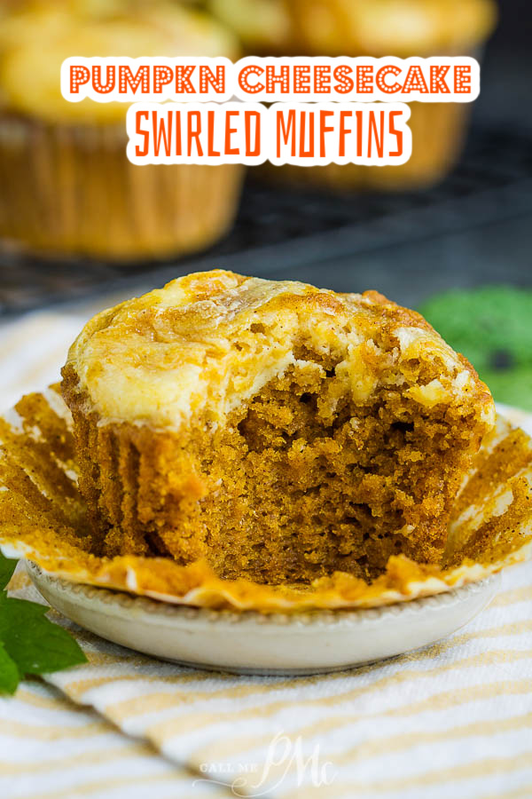 Perfectly soft and moist, Pumpkin Cream Cheese Swirl Muffins are topped with a luscious swirl of cheesecake. #muffins #pumpkin #easy #breakfast #recipe #cheesecake #brunch #pumpkinpie