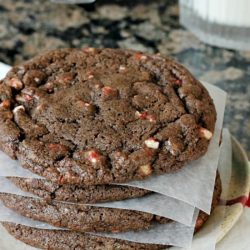 Stack of rich chocolate peppermint chip cookies.