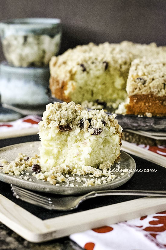 Best coffee cake ever!! Cranberry Eggnog Crumb Coffee Cake has so much flavor, is super moist, and that crumb topping is everything! A tender eggnog, vanilla cake is filled with cranberries and topped with a buttery crumb topping. A delicious treat for breakfast or dessert.