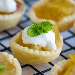 15-Minute Mini Apple Pies make a deliciously easy dessert. These bite-size pies are perfect for the holidays and entertaining! #apples #applepie #pie #dessert #recipe #homemade #easy