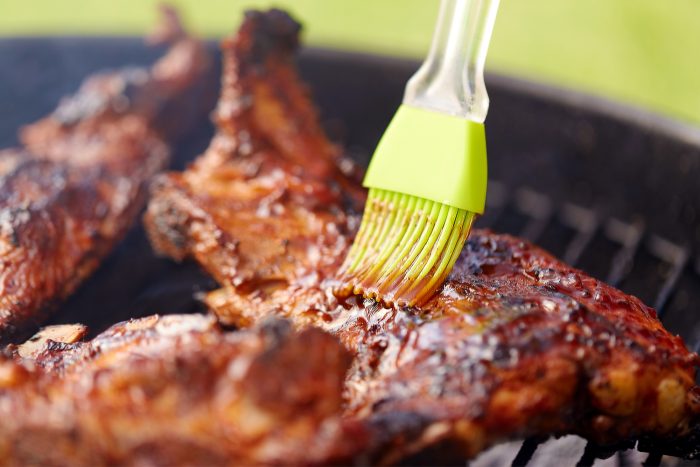 A close up of food featuring tender bites glazed with rich Slow Cooker Barbecue Sauce.