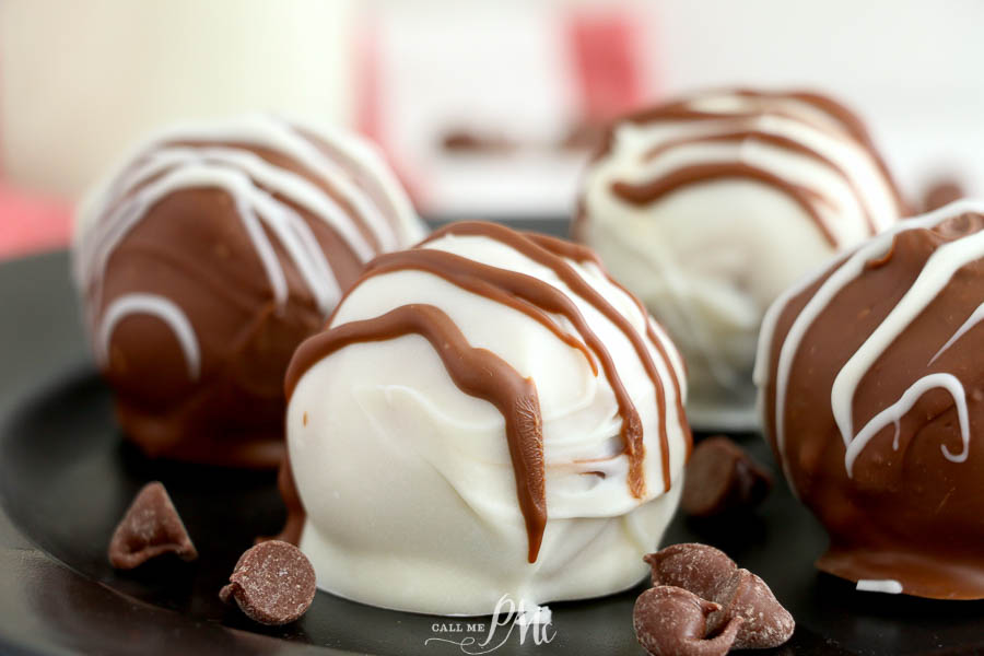 White chocoalte candy balls on a plate.