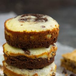 Cream Cheese Brownie Cups are deeply rich and fudgy brownies topped with a cheesecake-like topping. You're sure to love this simple yet elegant, quick yet gourmet-ish chocolate treat!