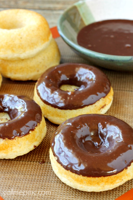 Baked Vanilla Donuts with Chocolate Frosting start with a simple vanilla batter. They're baked until lightly puffy and brown then dunked in smooth, rich chocolate! #breakfast #donuts #doughnuts #recipe #chocolate #easy #healthy