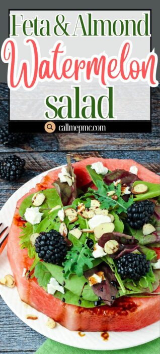 A slice of watermelon topped with mixed greens, blackberries, almonds, and crumbled feta cheese is served on a white plate. Text above reads "Feta Almond Watermelon Salad." Refreshing and vibrant, this salad is summer on a plate.