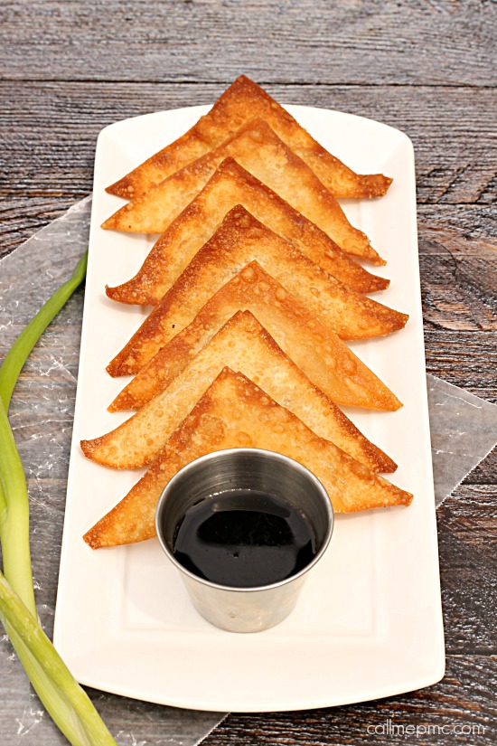 Wonton wrappers filled with bacon and cream cheese platter of bacon appetizers.