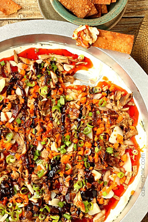Layered Sweet & Sour Asian Dip with Wonton Dippers Sweet & Sour Asian Dip in a dish.