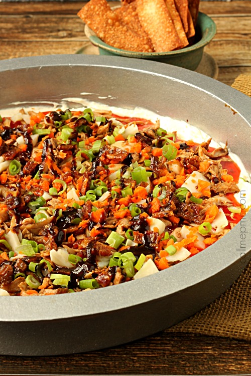 Layered Sweet & Sour Asian Dip with Wonton Dippers Food on a tray.