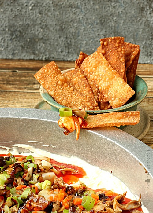 Layered Sweet & Sour Asian Dip with Wonton Dippers Wonton Dippers with dip on it.