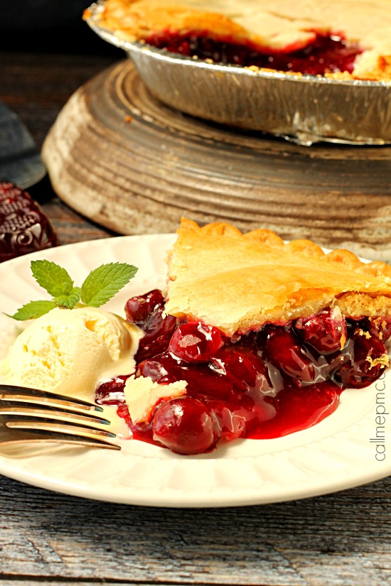 Classic Cherry Pie with Cinnamon Infused Coconut Oil Pie Crust Slice of dessert on a plate.
