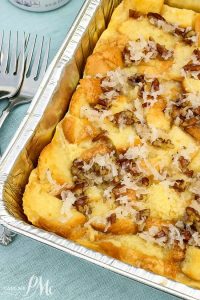 coconut bread pudding in aluminum baking pan.