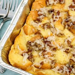 coconut bread pudding in aluminum baking pan.