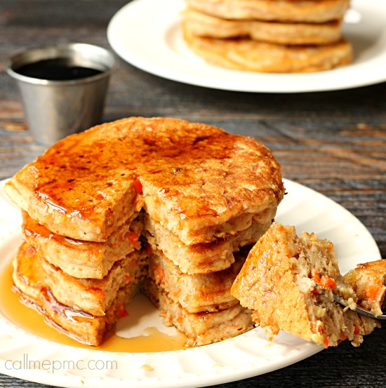 Stack of flapjacks on a plate.