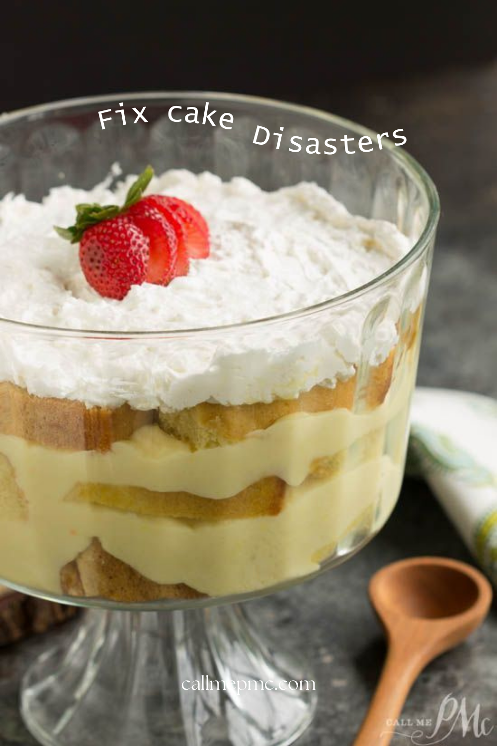 A trifle dessert in a glass bowl with layers of cake, custard, and whipped cream, topped with a sliced strawberry. The text reads “How to Fix Cake Disasters.”.