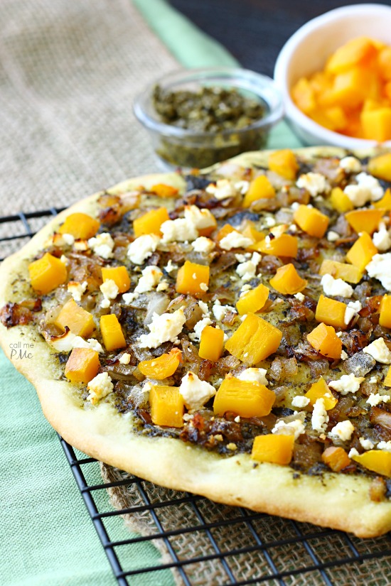 Caramelized Onion Butternut Squash Pesto Pizza Recipe is full of roasted butternut squash, slightly sweet onions and garden fresh pesto.